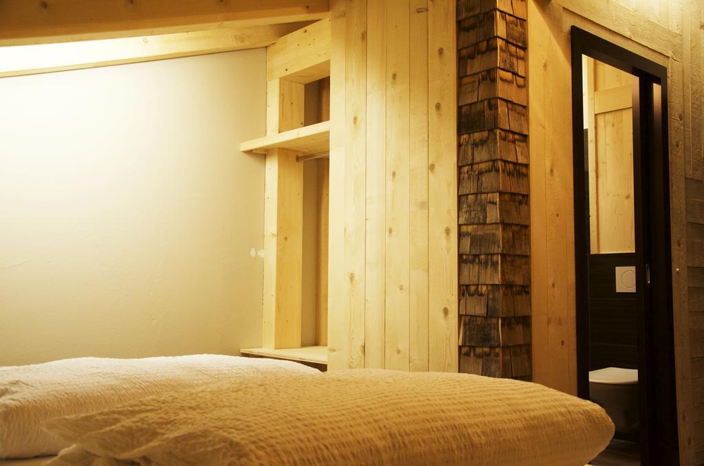 Huettenhotel Husky Lodge Muotathal Rom bilde